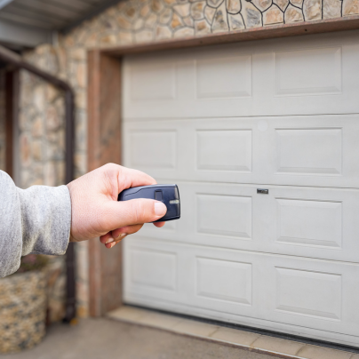 Miami security key fob pointing to a garage door